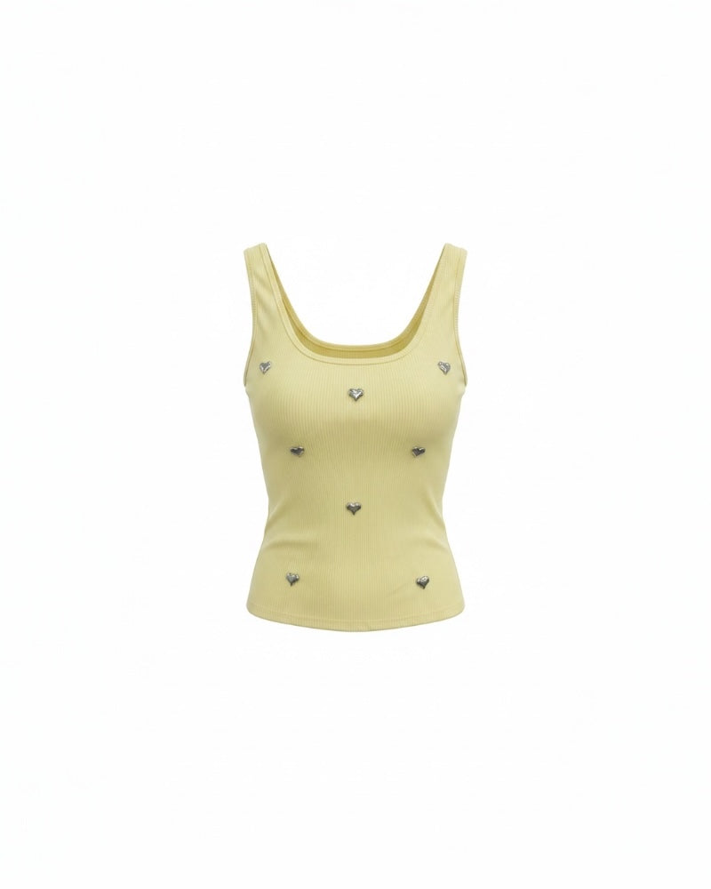 Jersey  canalé amarillo con detalle de corazones metálicos