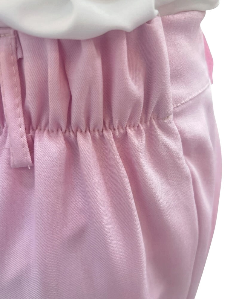 Pantalón palazzo rosa de tiro alto con diseño fluido
