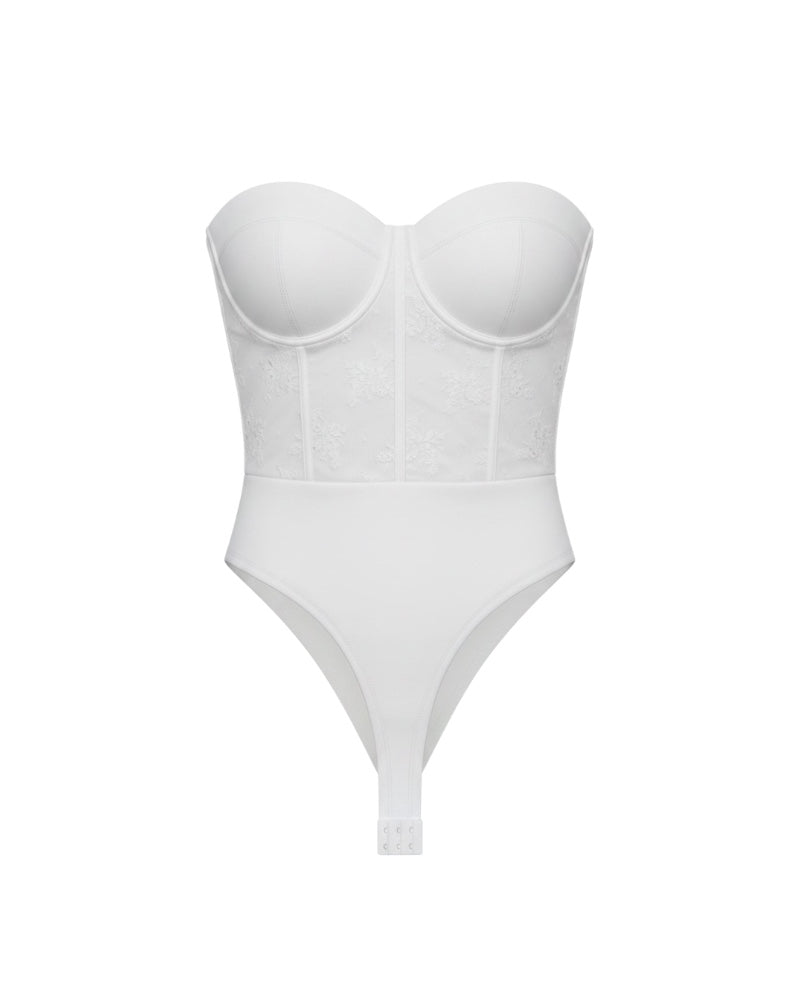 Body blanco estilo corsé con detalle de encaje y efecto moldeador.